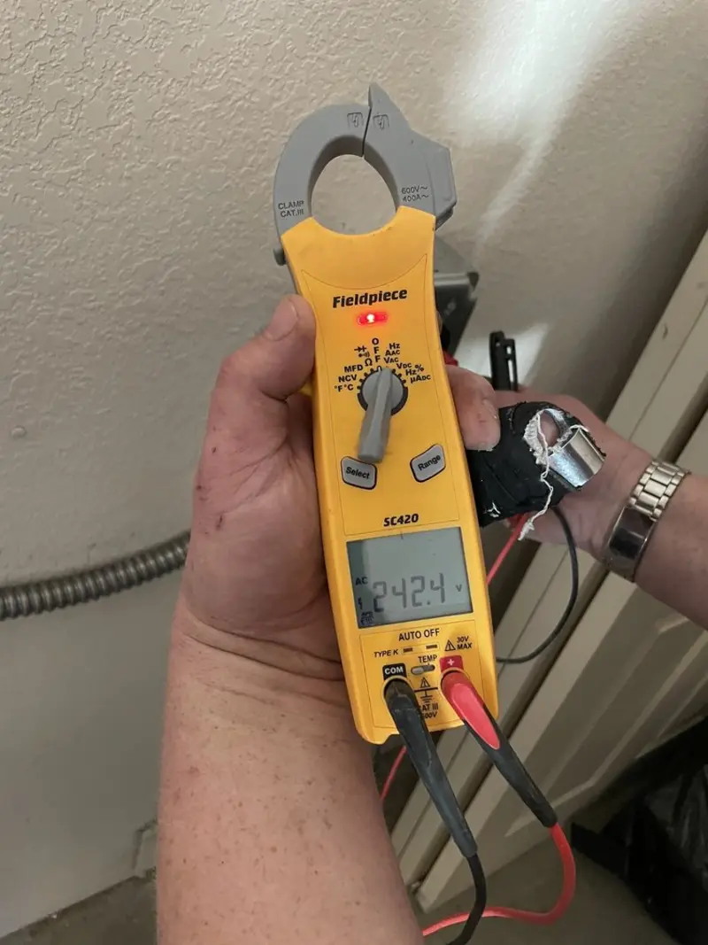 Voltage testing with clamp meter during Generator Installation in Northern Cambria